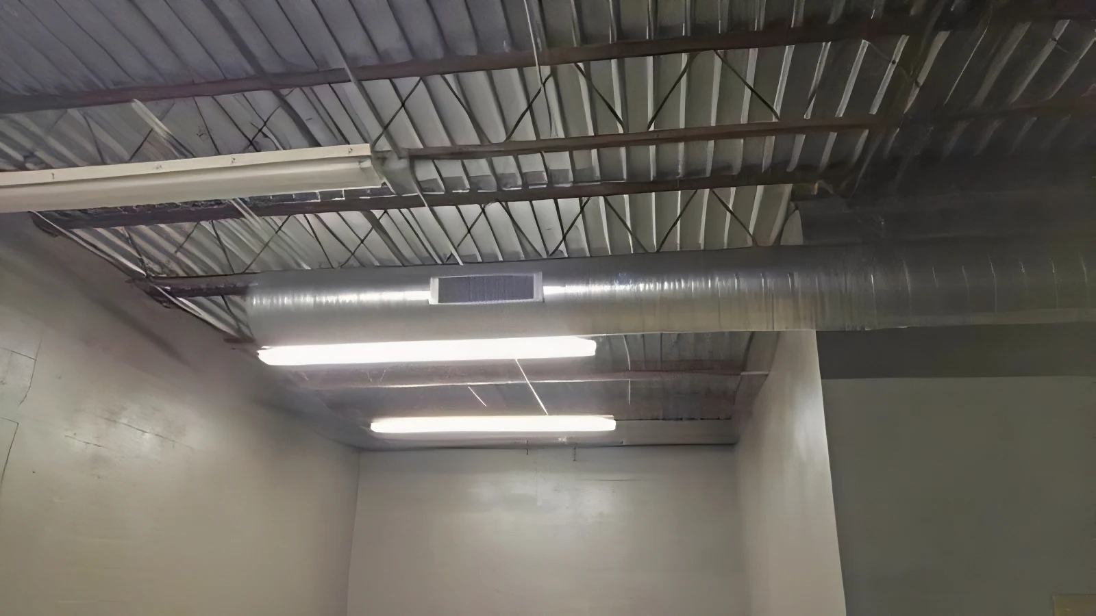 Warehouse Demising Wall Soundproofing with Wall Blokker Membrane and QuietRock