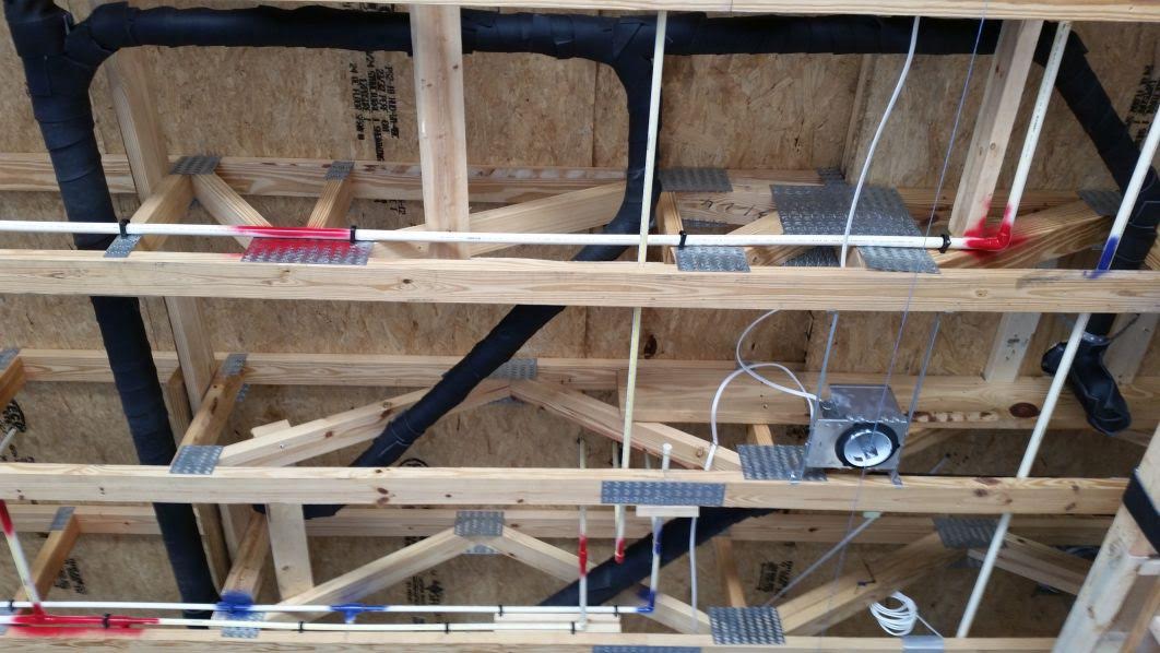 Pipe lagging install on residential bathroom drain stack