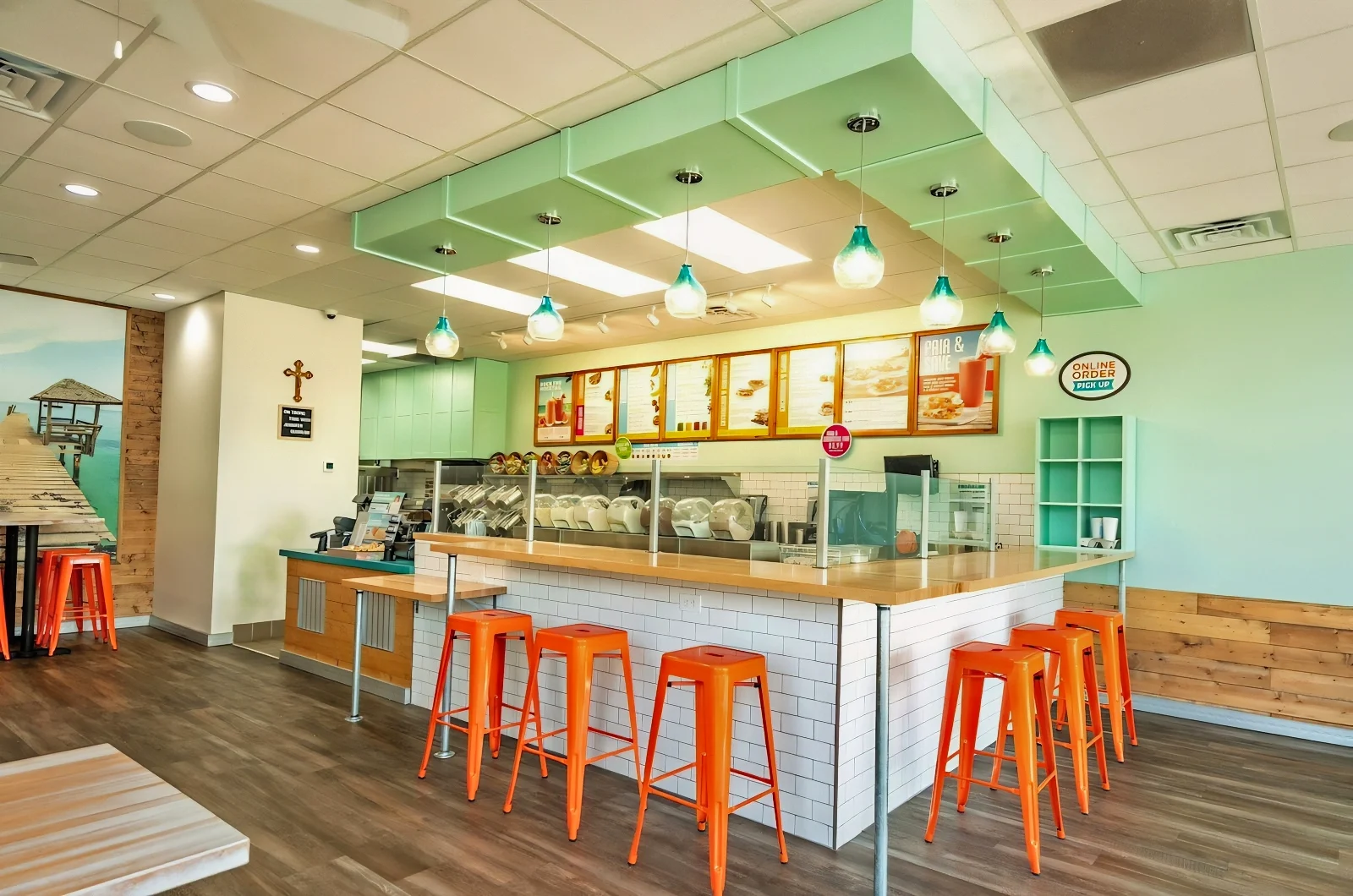 Custom-Printed Acoustic Art Panels Install for Tropical Smoothie Cafe