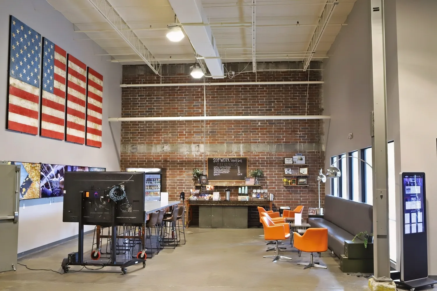 Custom Hanging Acoustic Wings Over Six-Person Desks SOFWERX Acoustic Treatment