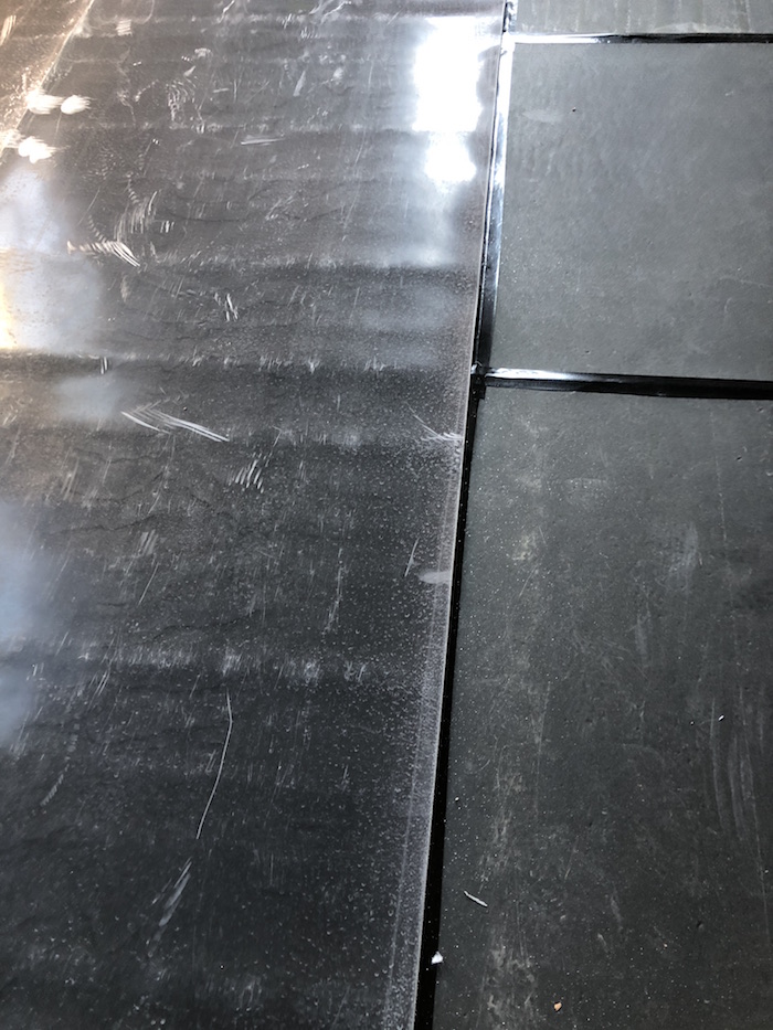 EVA foam decoupling layer over Floor Blokker membrane retrofit