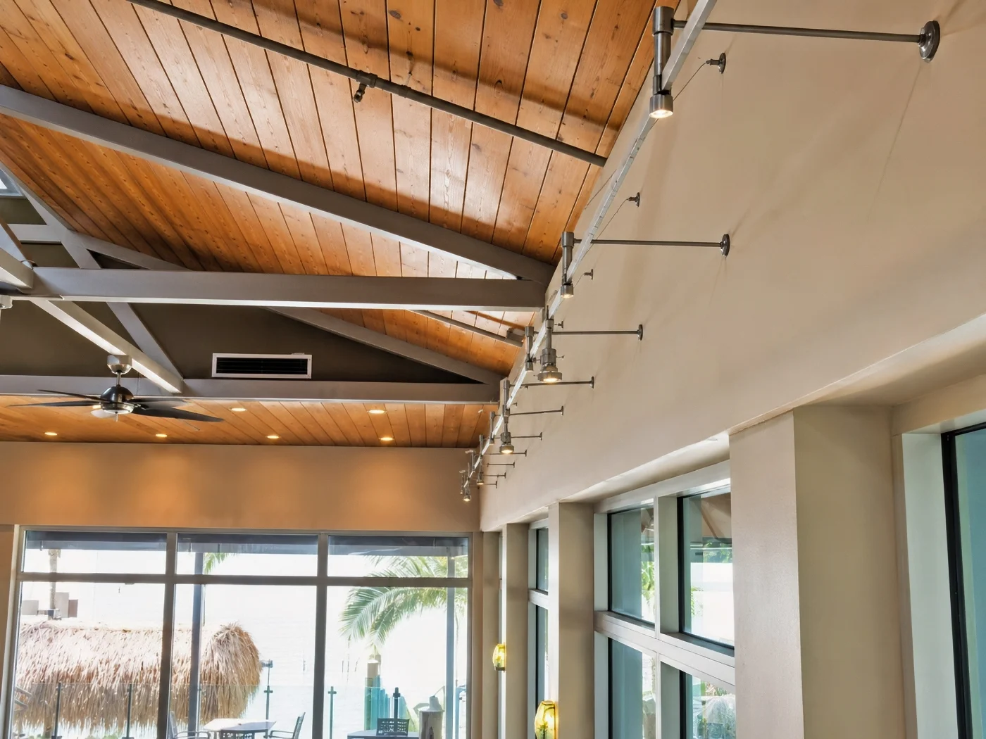 Acoustic Wall Panel Coverage with Custom Track Cuts at Fins at Sharky’s Venice FL