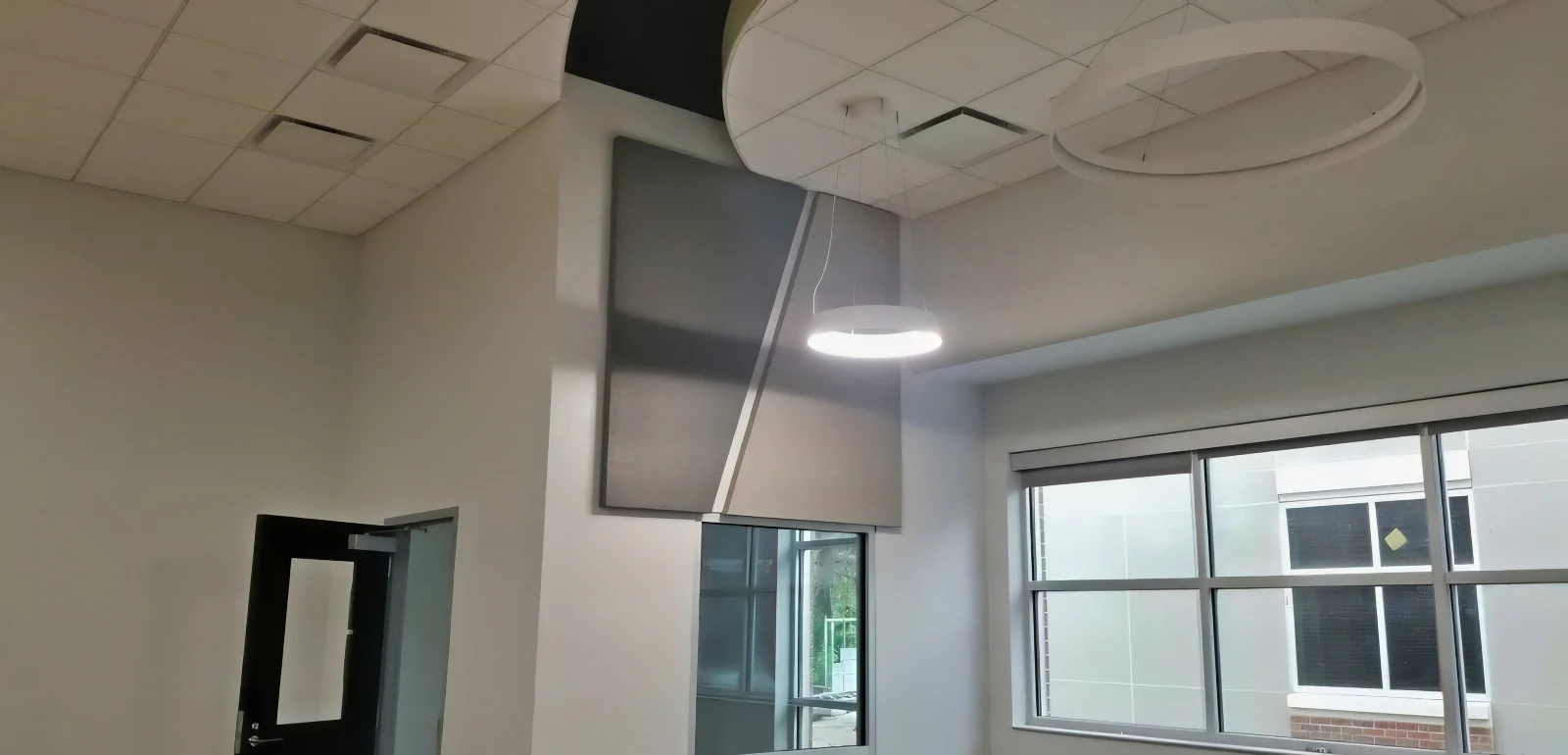 Fabric-Wrapped Wall Panels Mounted on the Walls