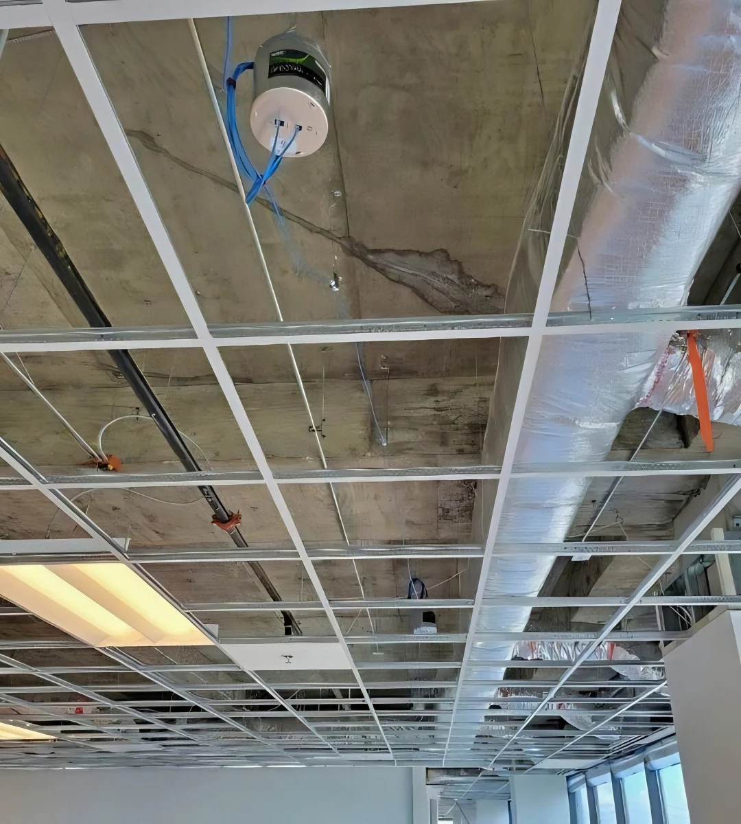 Sound Masking Speakers Concealed by ACT Grid