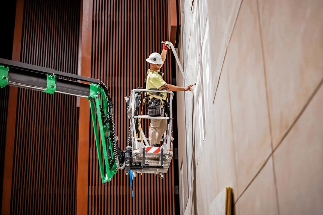 Installing Custom Wall Panels at Chapin Theater.