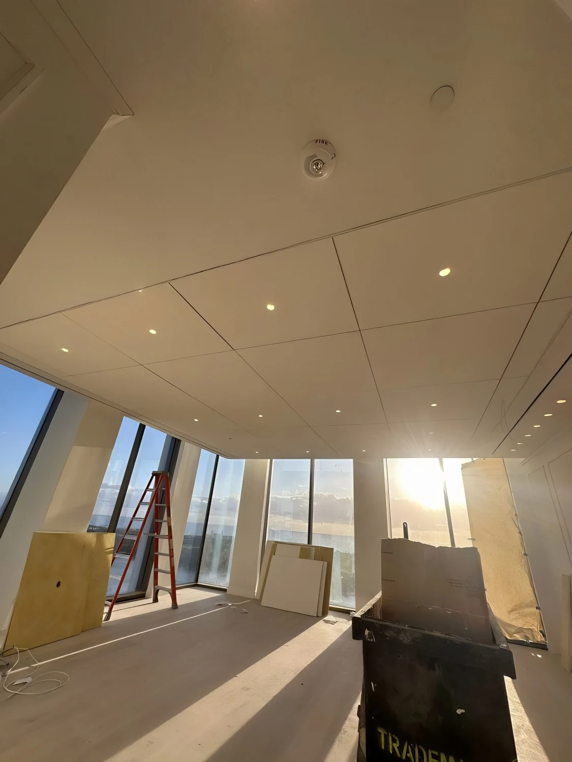 Install of NRC Ceiling Tiles in the Modern Biohaven Office