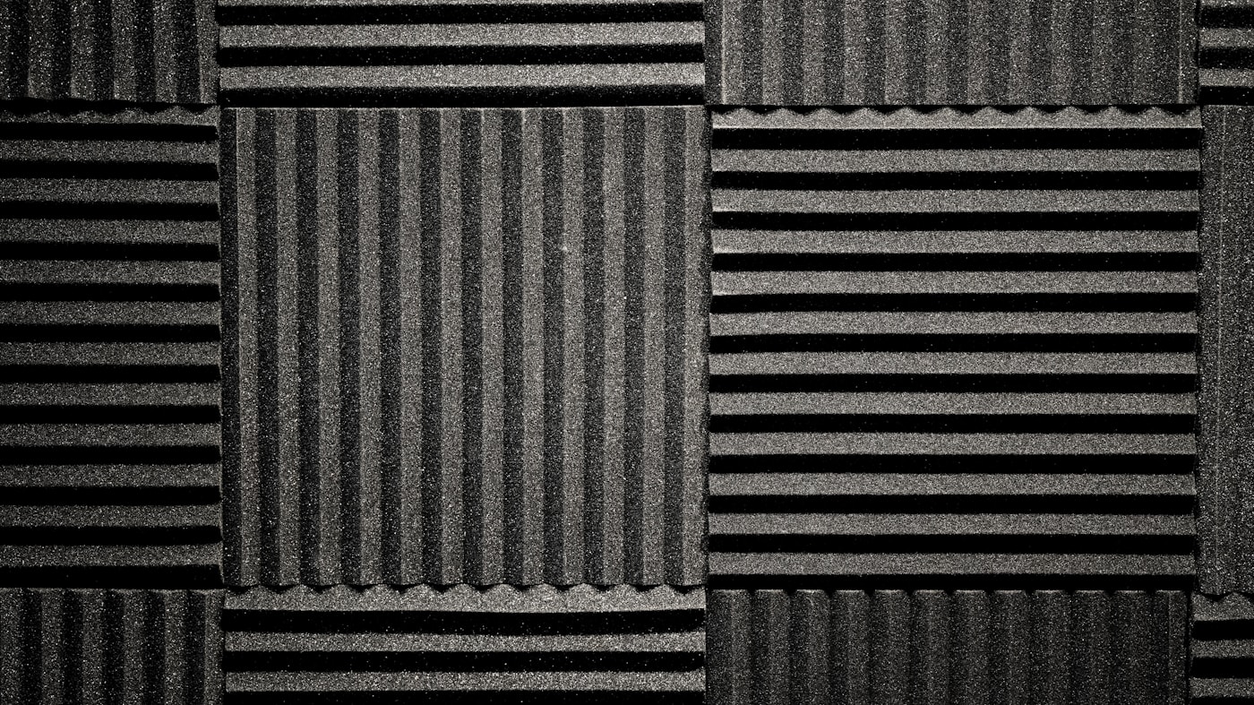 Close-up of an architectural acoustic wall surface showing the kind of treatment our consulting projects specify