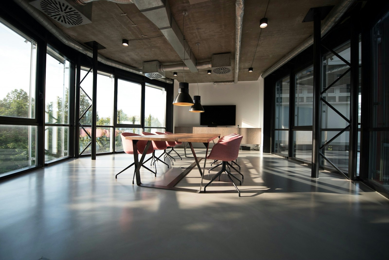 Modern open meeting room — a typical commercial environment where these acoustic tools get used