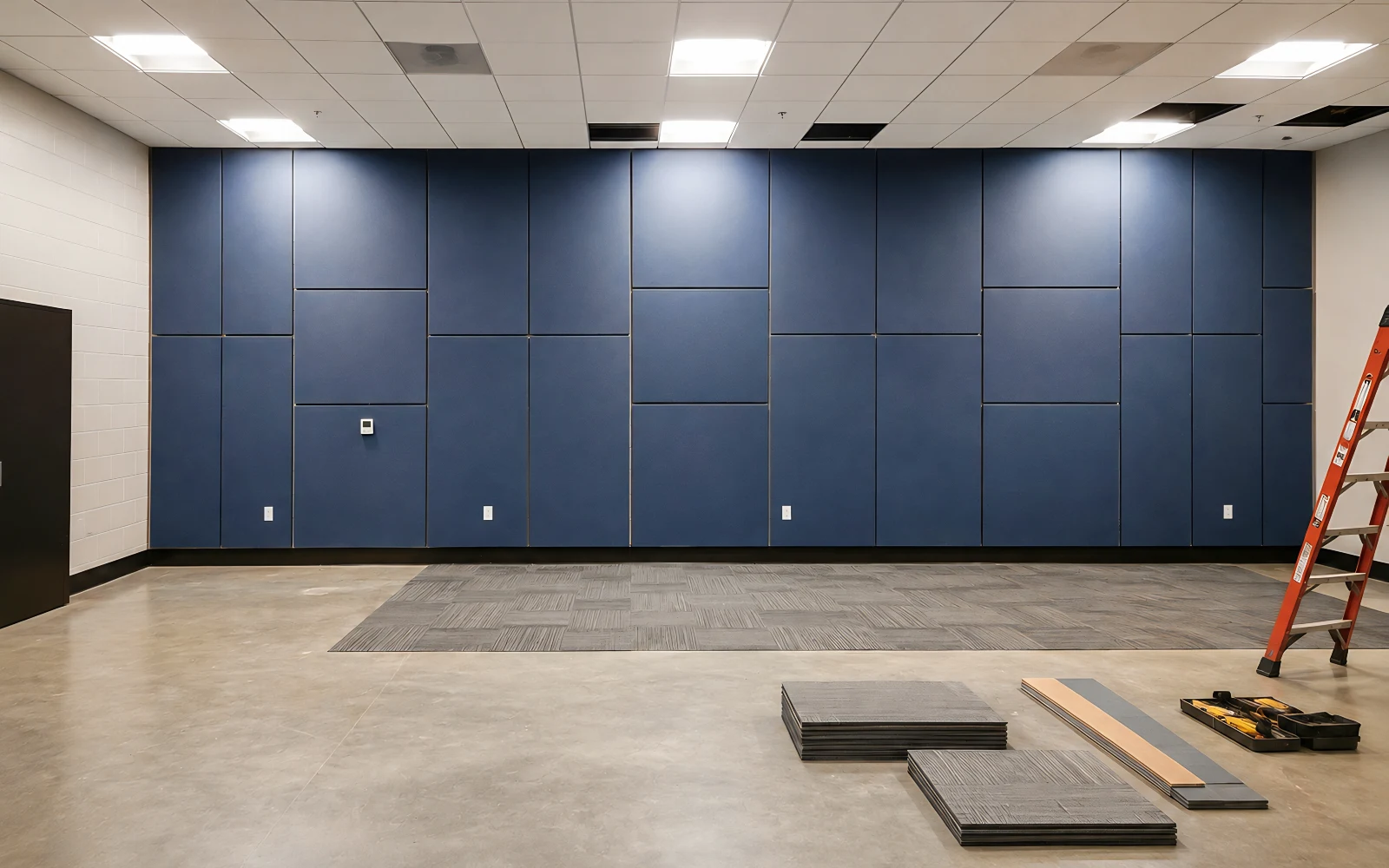 Installing Sound Absorbing Wall Panels at NAVFAC Camp Lejeune